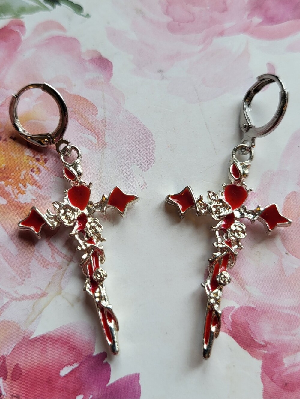 Red silver-tone rose vine cross earrings